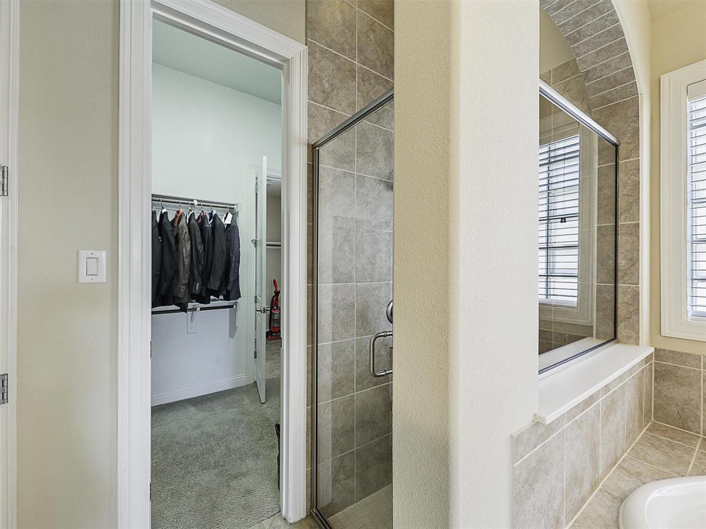 4901 Dolorosa Lane Prosper, TX 75078 - Photo 23 of 37 Master Closet has a door leading into the laundry room.