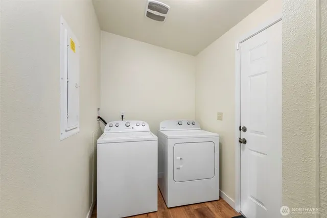 a utility room with dryer and washer