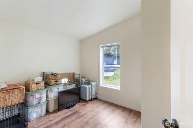 a room with furniture and a window