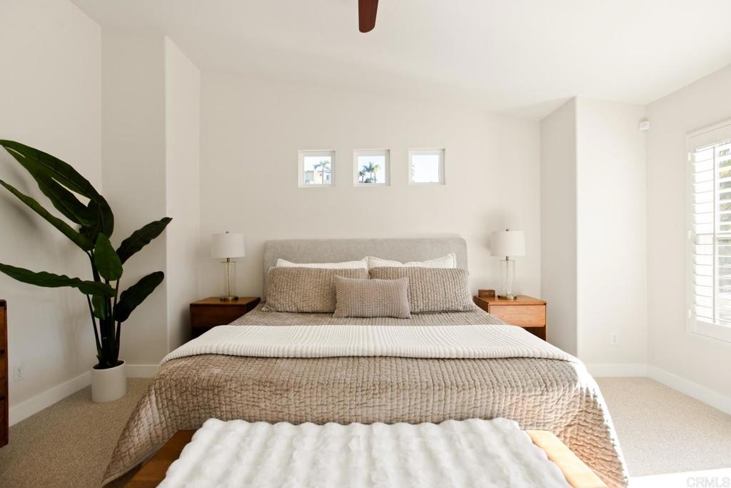 4183 Twilight Ridge San Diego, CA 92130 - Photo 12 of 46 a bedroom with a bed and a window