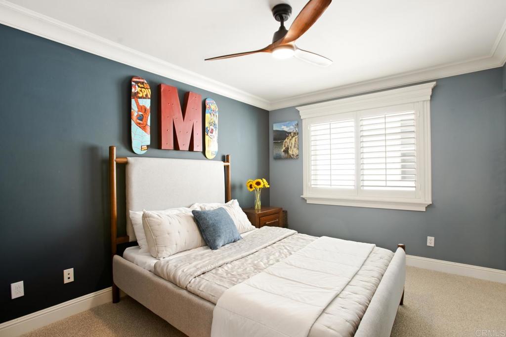 4183 Twilight Ridge San Diego, CA 92130 - Photo 21 of 46 a bedroom with a bed and window