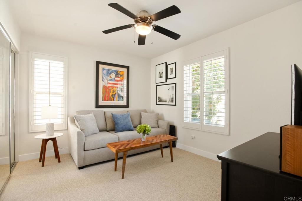 4183 Twilight Ridge San Diego, CA 92130 - Photo 24 of 46 a living room with furniture and a window