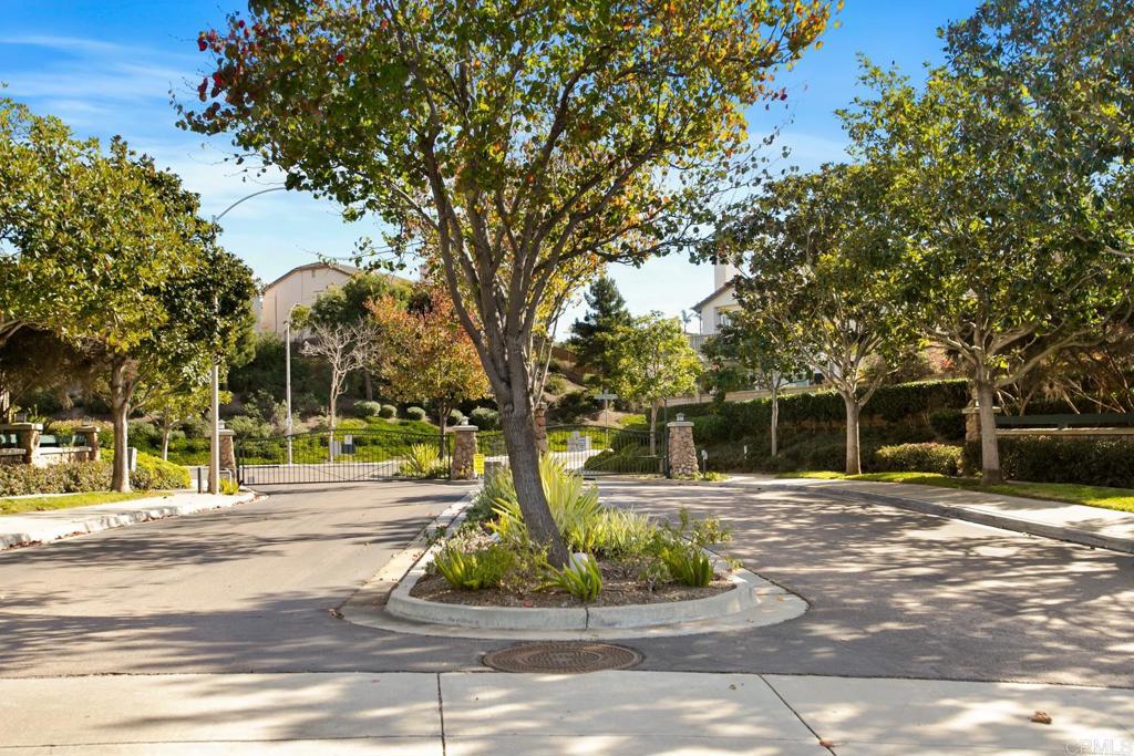 4183 Twilight Ridge San Diego, CA 92130 - Photo 33 of 46 a front view of a house with a yard