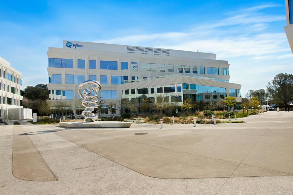 4183 Twilight Ridge San Diego, CA 92130 - Photo 40 of 46 a front view of a building with sitting area