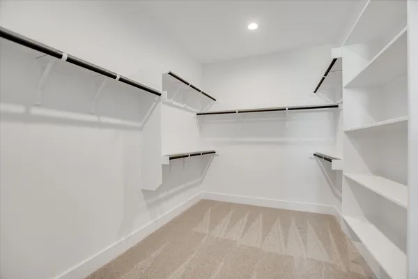 a view of a room with racks on the wall
