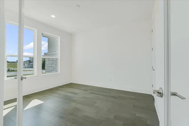 an empty room with windows