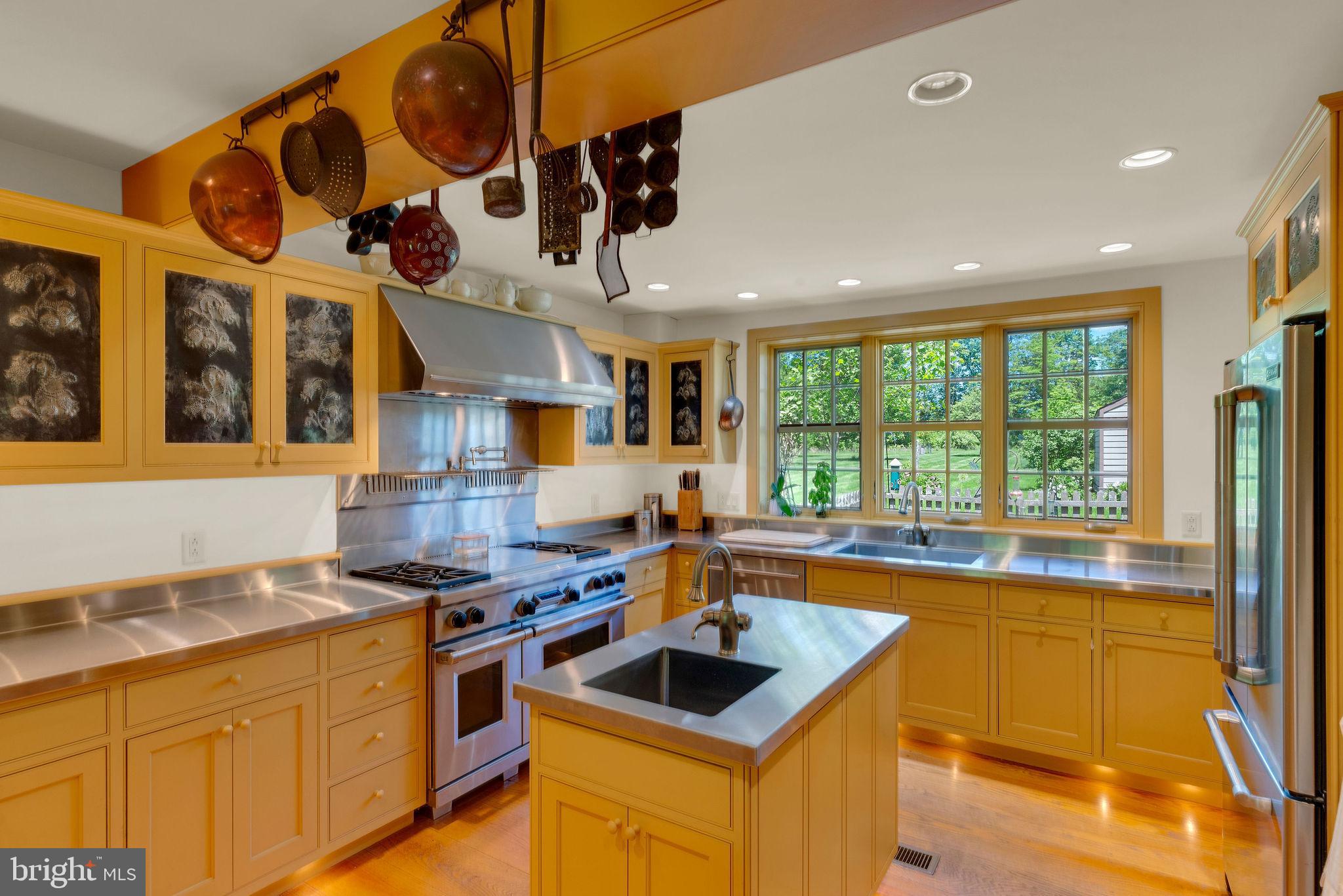 82 Tory Road Pipersville, PA 18947 - Photo 11 of 76 a kitchen that has a lot of cabinets in it