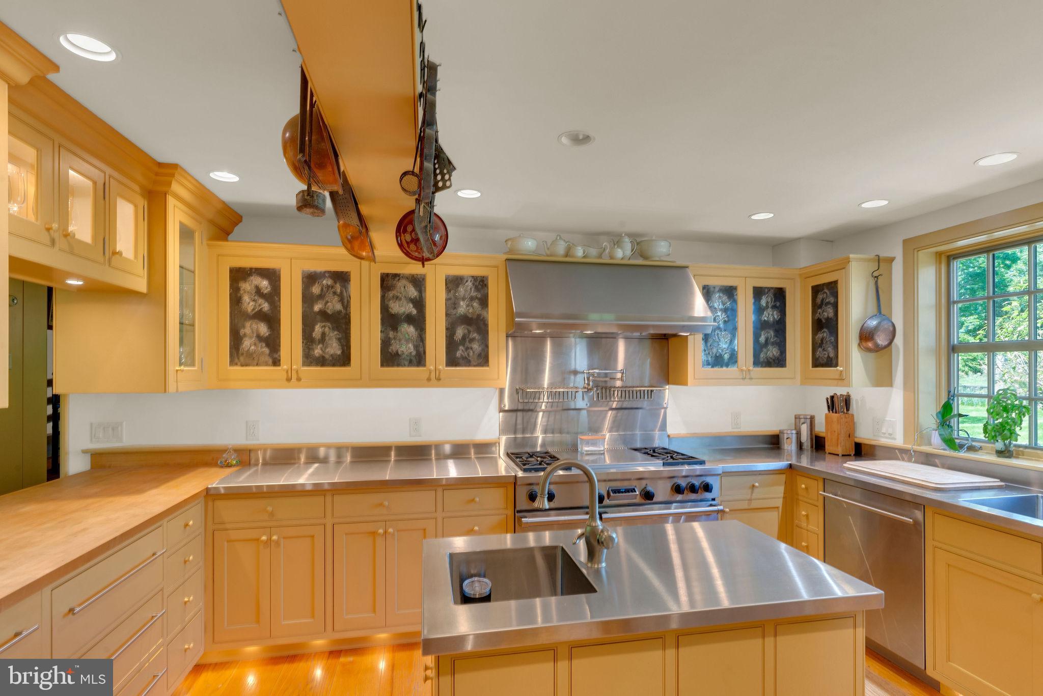 82 Tory Road Pipersville, PA 18947 - Photo 12 of 76 a kitchen with stainless steel appliances granite countertop a stove and a sink