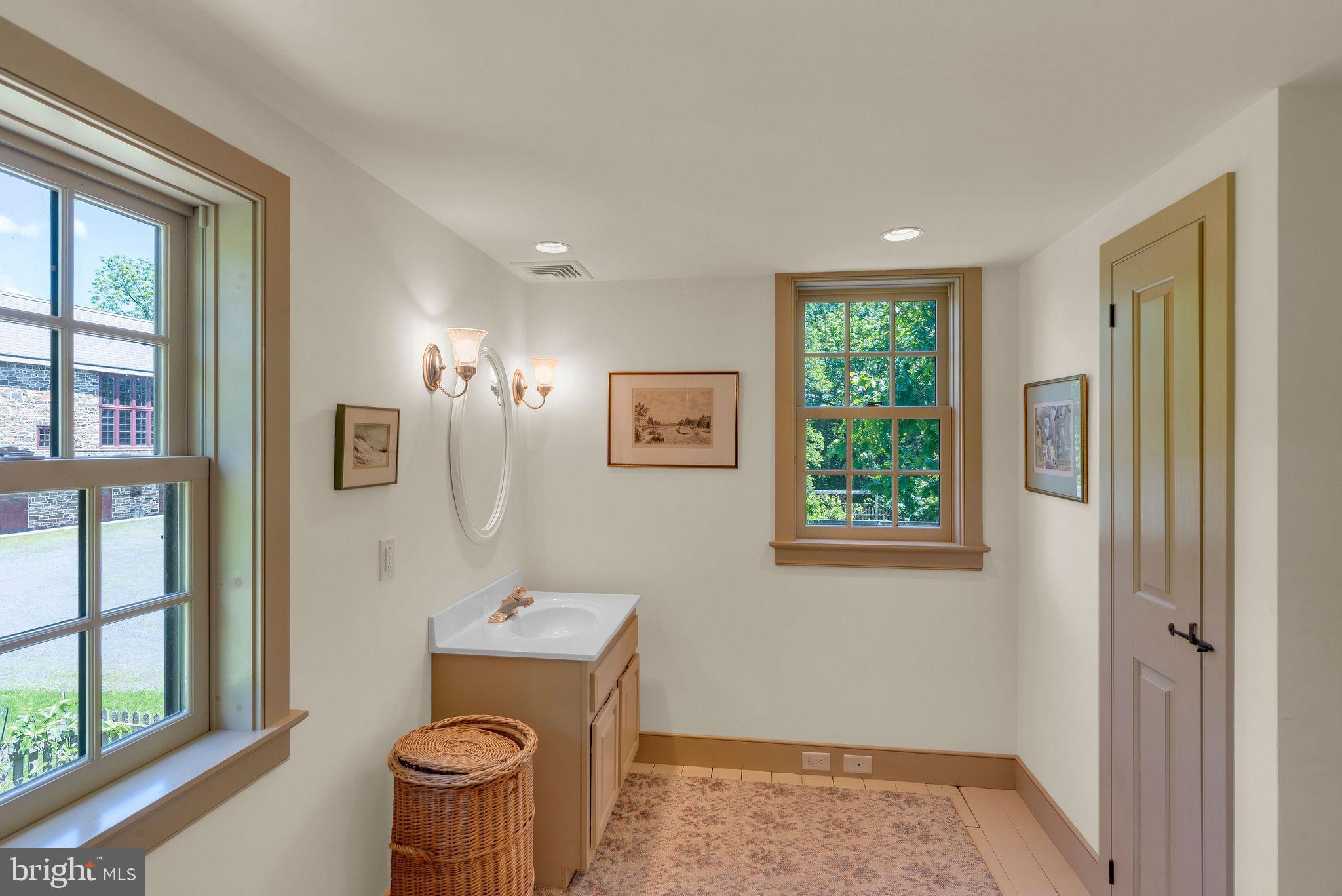 82 Tory Road Pipersville, PA 18947 - Photo 28 of 76 a bathroom with a toilet a sink and a window