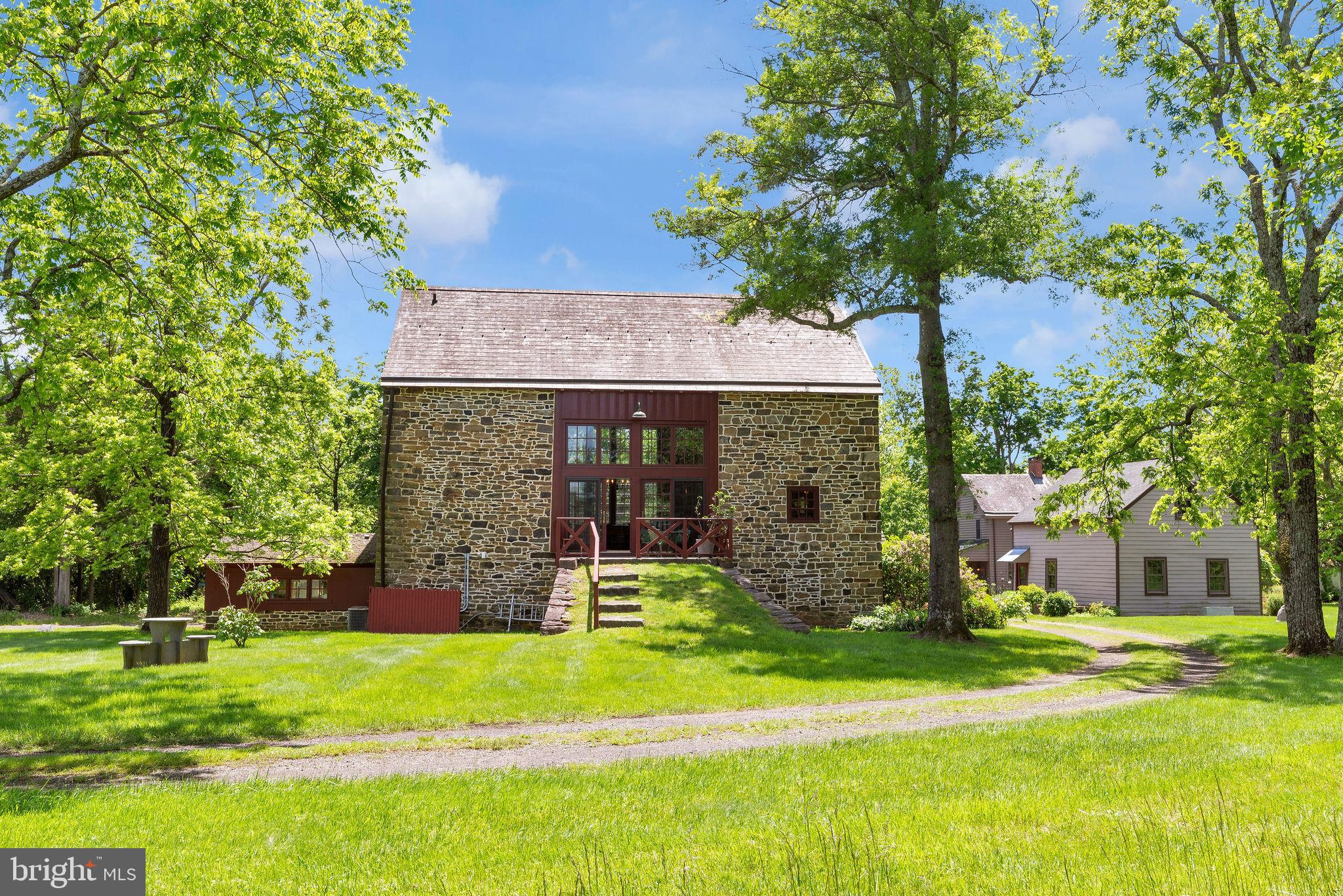 82 Tory Road Pipersville, PA 18947 - Photo 32 of 76 a front view of a house with garden