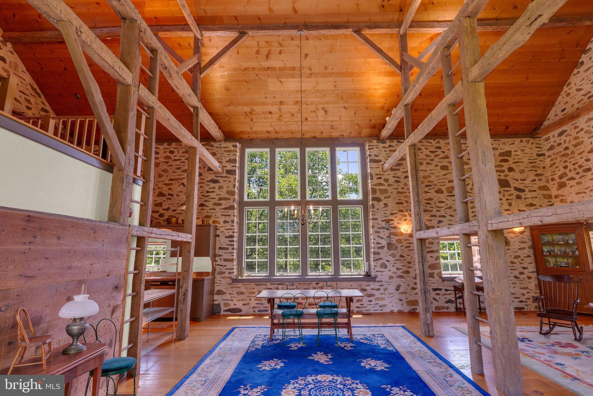 82 Tory Road Pipersville, PA 18947 - Photo 33 of 76 a living room with furniture a rug and a large window