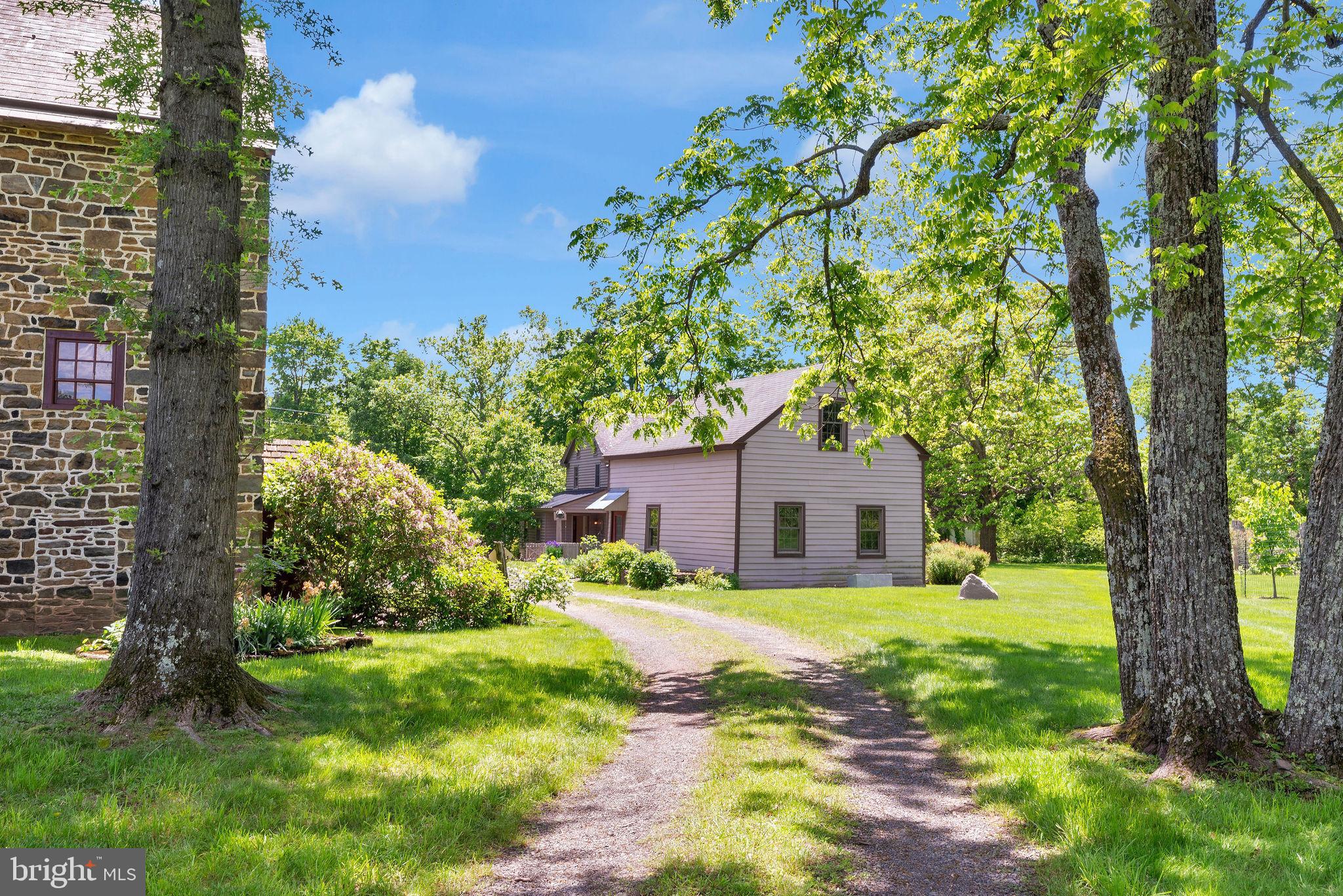 82 Tory Road Pipersville, PA 18947 - Photo 57 of 76 a front view of a house with garden