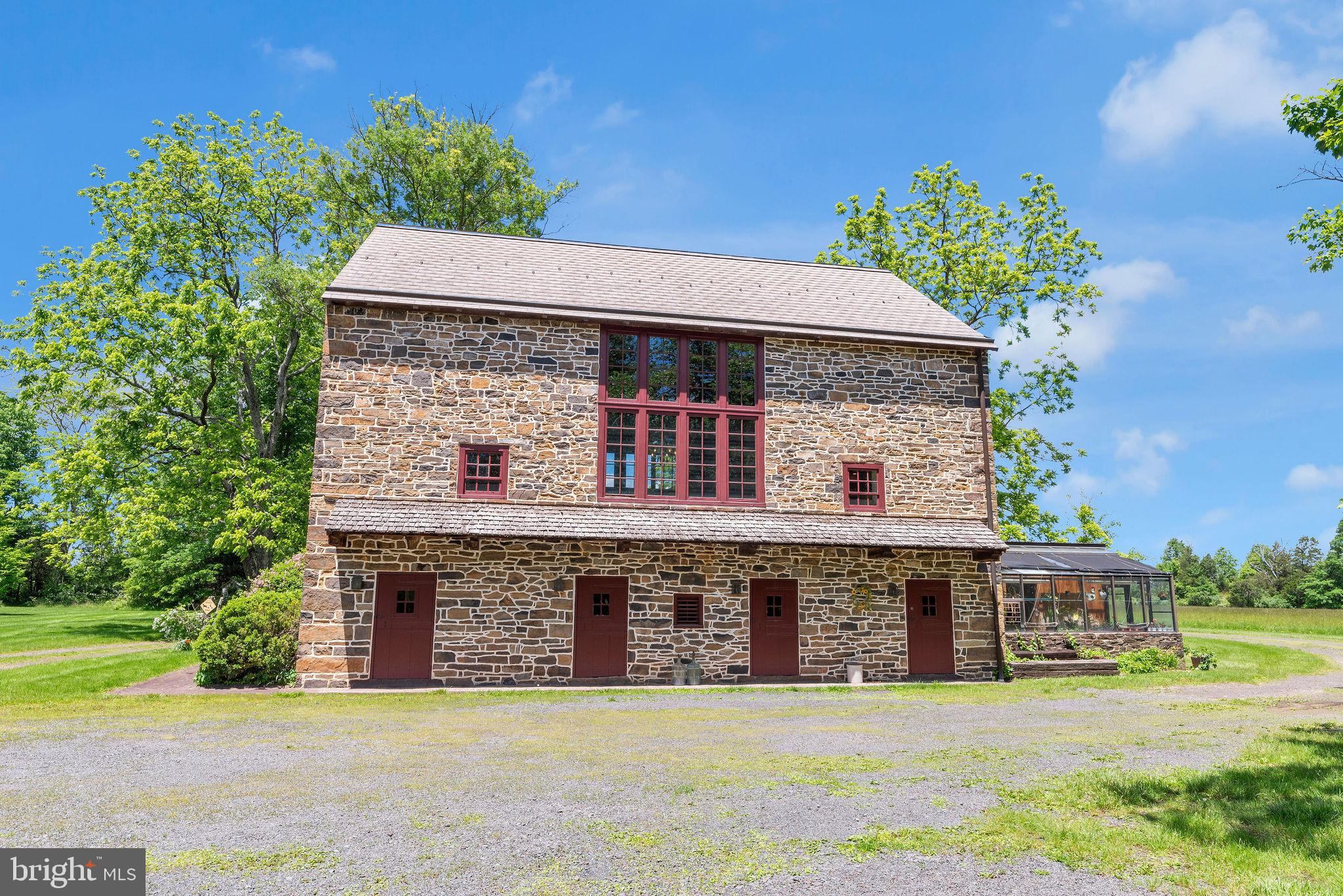 82 Tory Road Pipersville, PA 18947 - Photo 60 of 76 a front view of a house with a garden