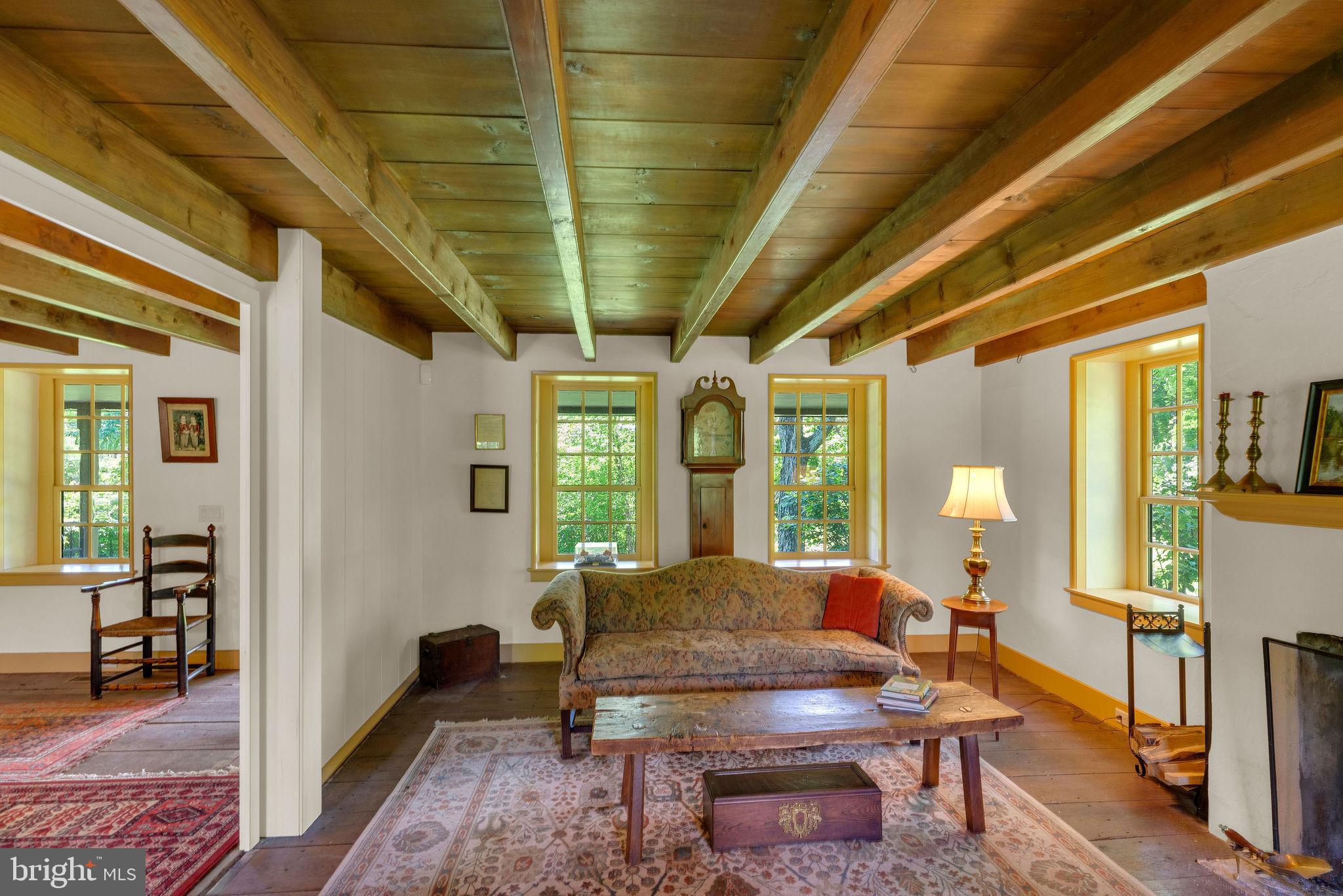 82 Tory Road Pipersville, PA 18947 - Photo 6 of 76 a living room with furniture a table and wooden floor