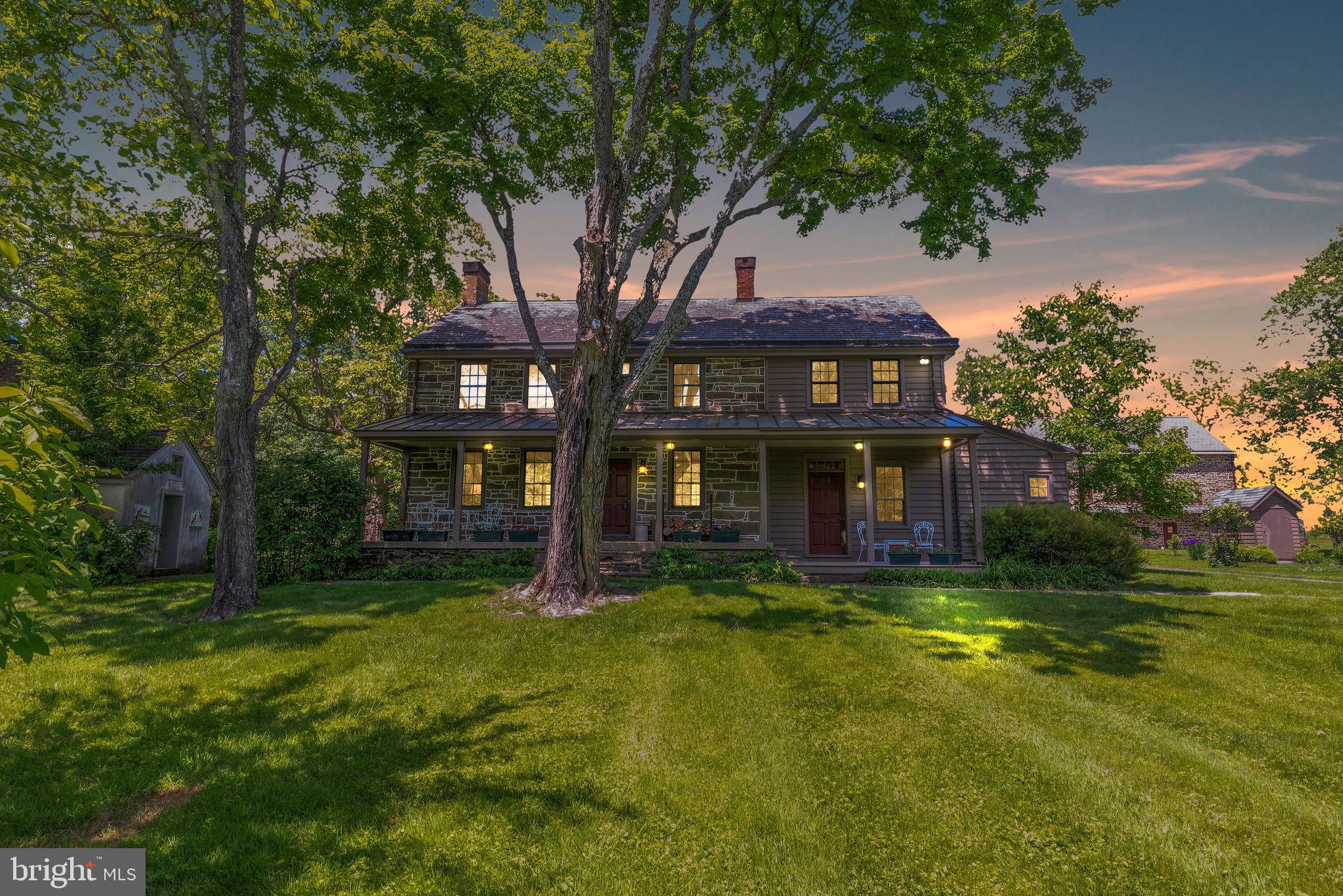 82 Tory Road Pipersville, PA 18947 - Photo 74 of 76 a view of a large building with a big yard and large trees
