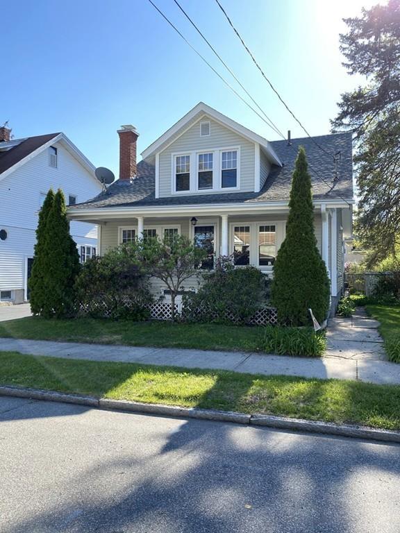 52 Sunapee Street Springfield, MA 01108 - Photo 1 of 33 a front view of a house with a yard and garage