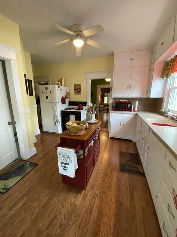 52 Sunapee Street Springfield, MA 01108 - Photo 13 of 33 a kitchen with stainless steel appliances a stove a sink dishwasher and a refrigerator
