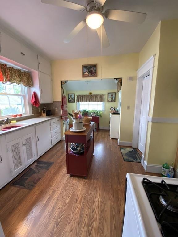 52 Sunapee Street Springfield, MA 01108 - Photo 14 of 33 a living room with furniture and a fireplace