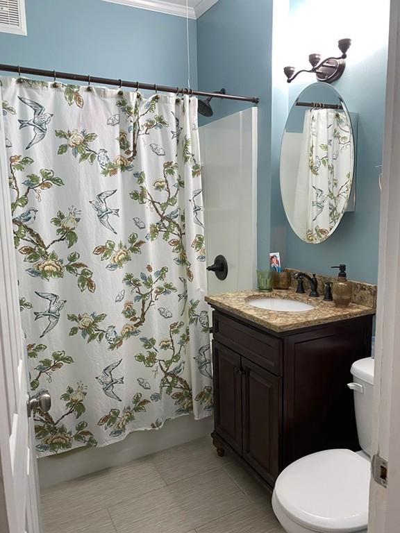 52 Sunapee Street Springfield, MA 01108 - Photo 16 of 33 a bathroom with a sink toilet and a mirror