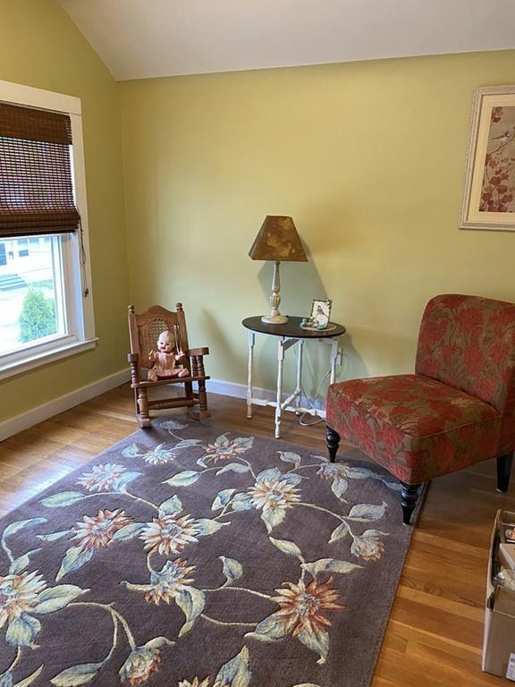 52 Sunapee Street Springfield, MA 01108 - Photo 26 of 33 a living room with a couch and a window