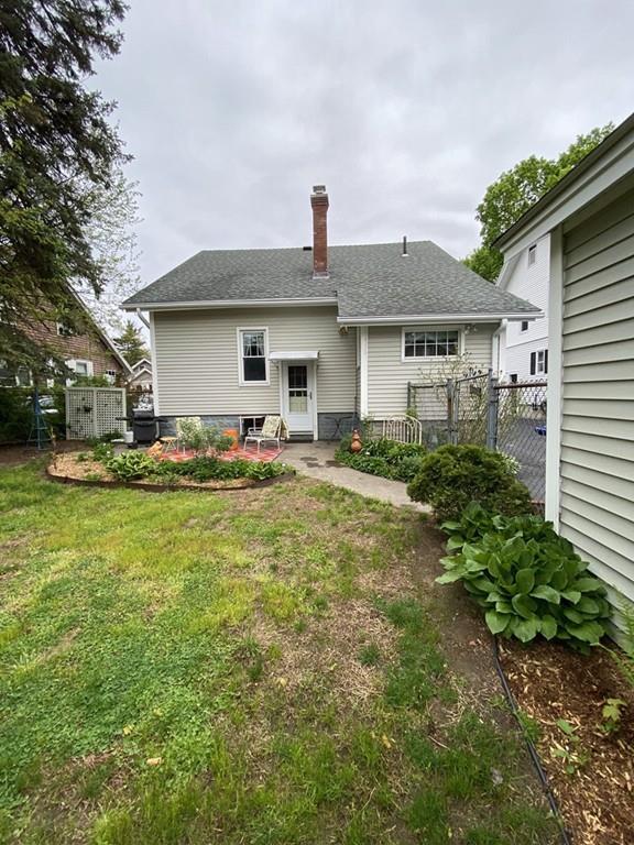52 Sunapee Street Springfield, MA 01108 - Photo 5 of 33 a front view of a house with a yard