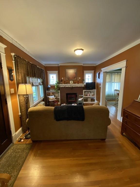 52 Sunapee Street Springfield, MA 01108 - Photo 8 of 33 a large bedroom with a bed window and dresser