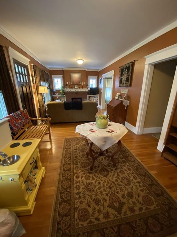 52 Sunapee Street Springfield, MA 01108 - Photo 9 of 33 a living room with furniture and a flat screen tv