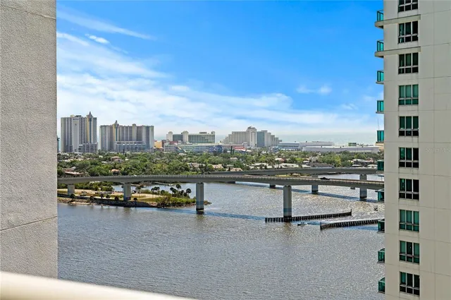 a view of a city with tall buildings