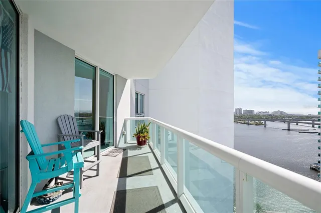 a view of balcony with furniture