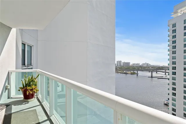 a view of balcony with furniture