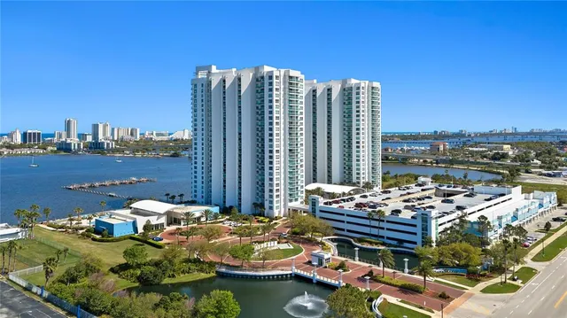 a outdoor space with swimming pool and lake view