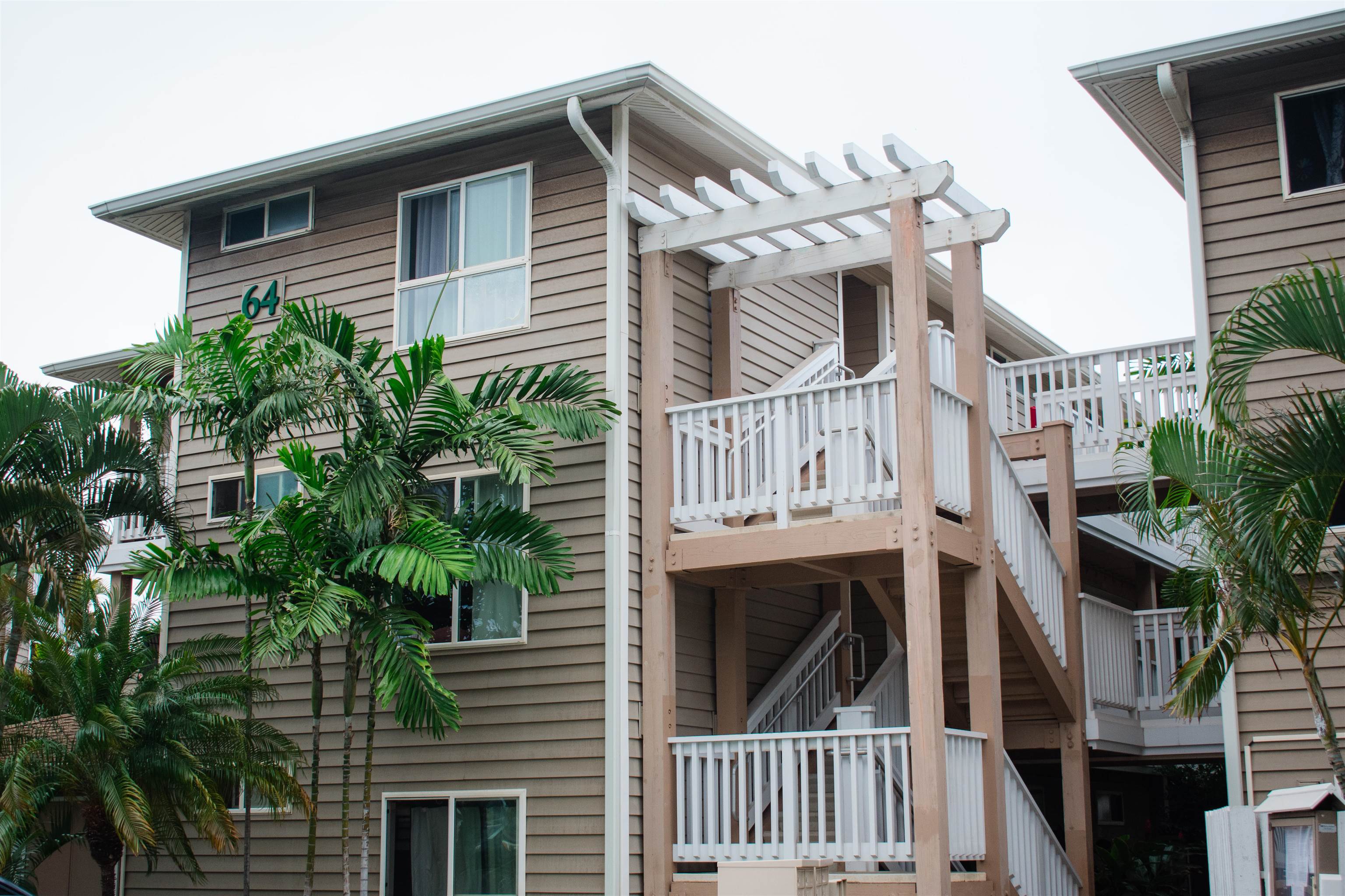 a view of front of house with deck and garden