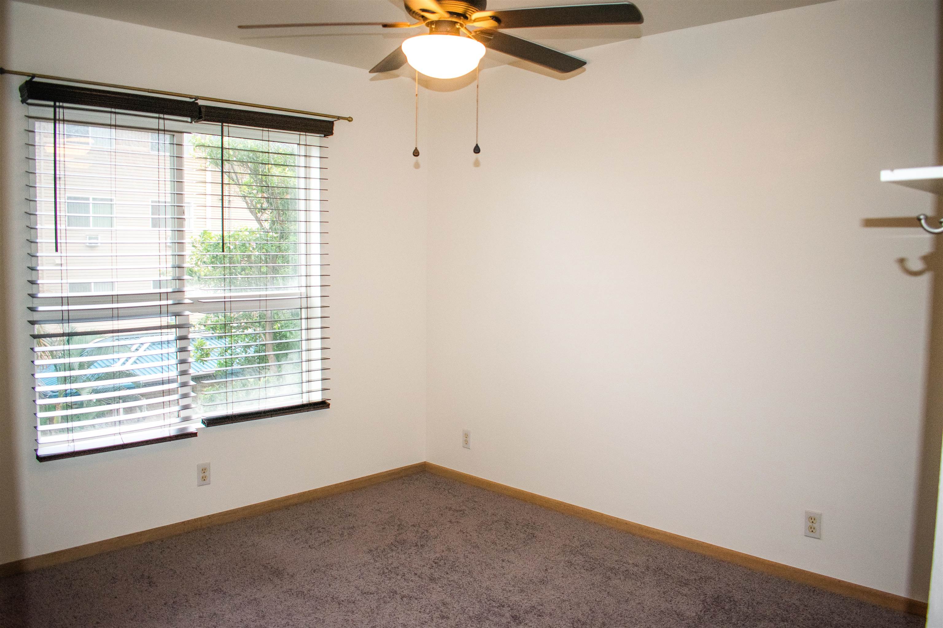 64 Kunihi Lane, Unit 324 Kahului, HI 96732 - Photo 15 of 31 an empty room with a window