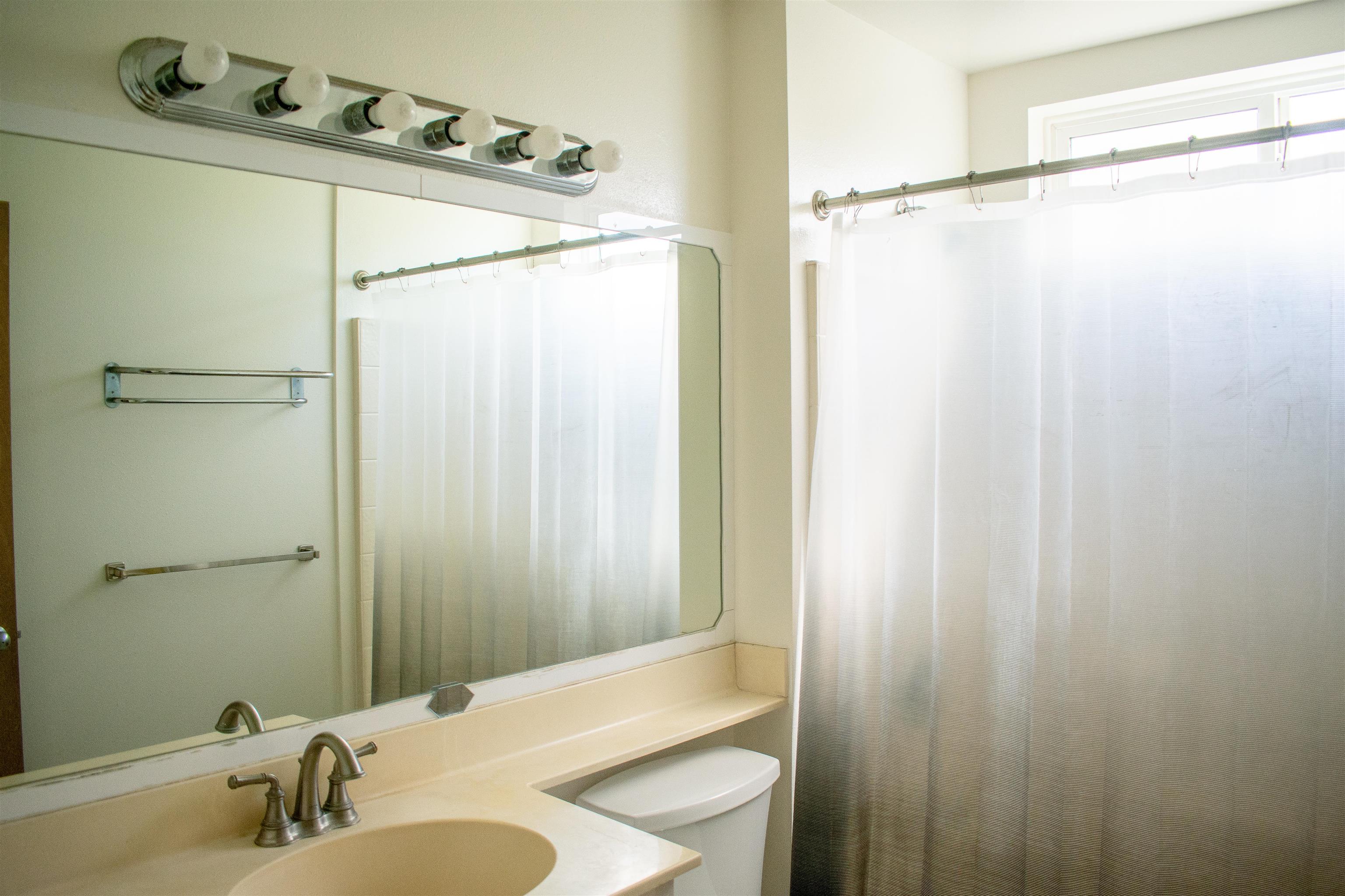64 Kunihi Lane, Unit 324 Kahului, HI 96732 - Photo 19 of 31 a bathroom with a sink and shower
