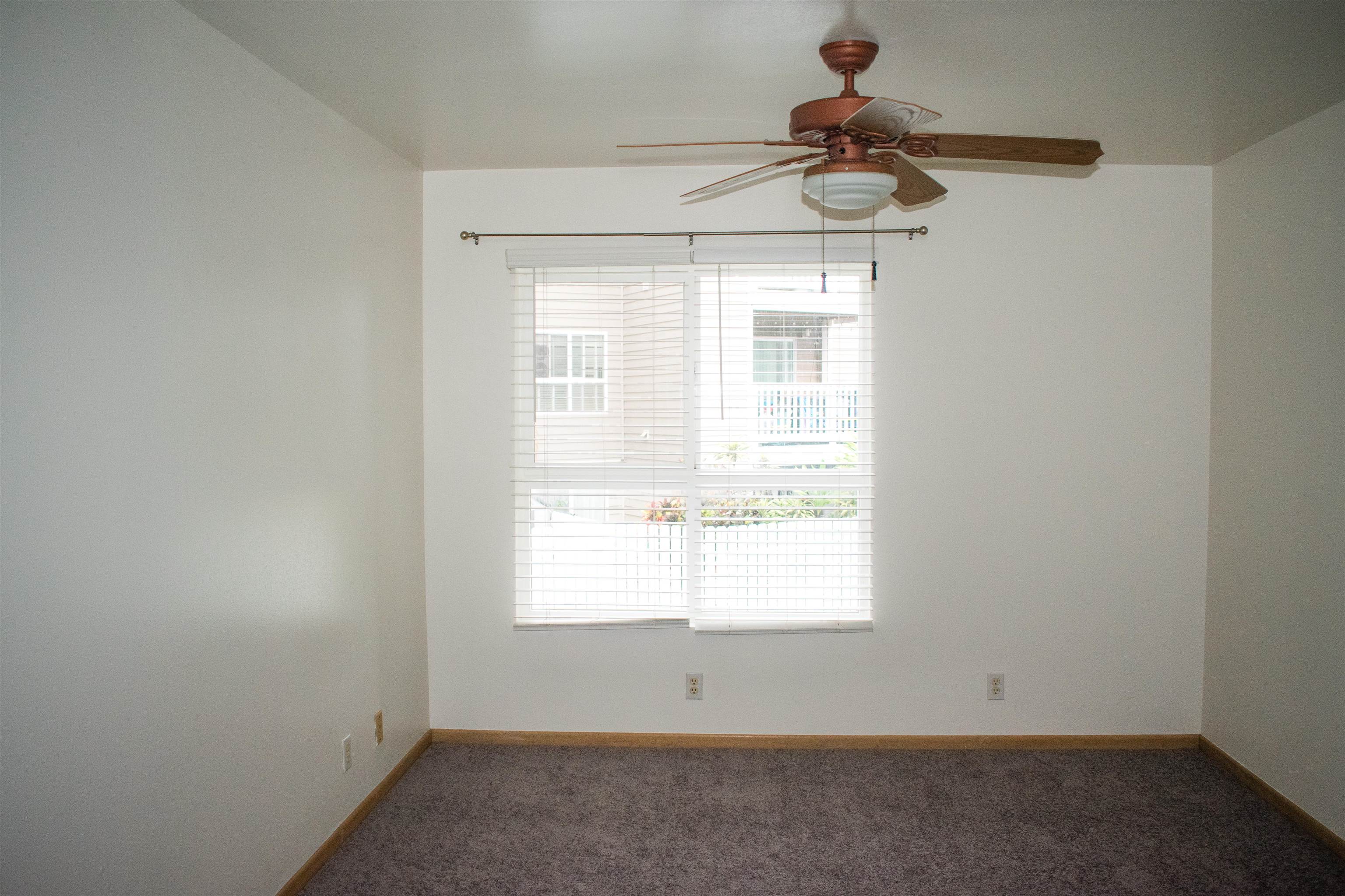 64 Kunihi Lane, Unit 324 Kahului, HI 96732 - Photo 21 of 31 an empty room with a window
