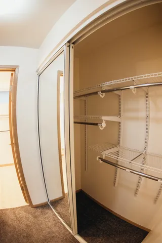 a bathroom with a sink a toilet and vanity