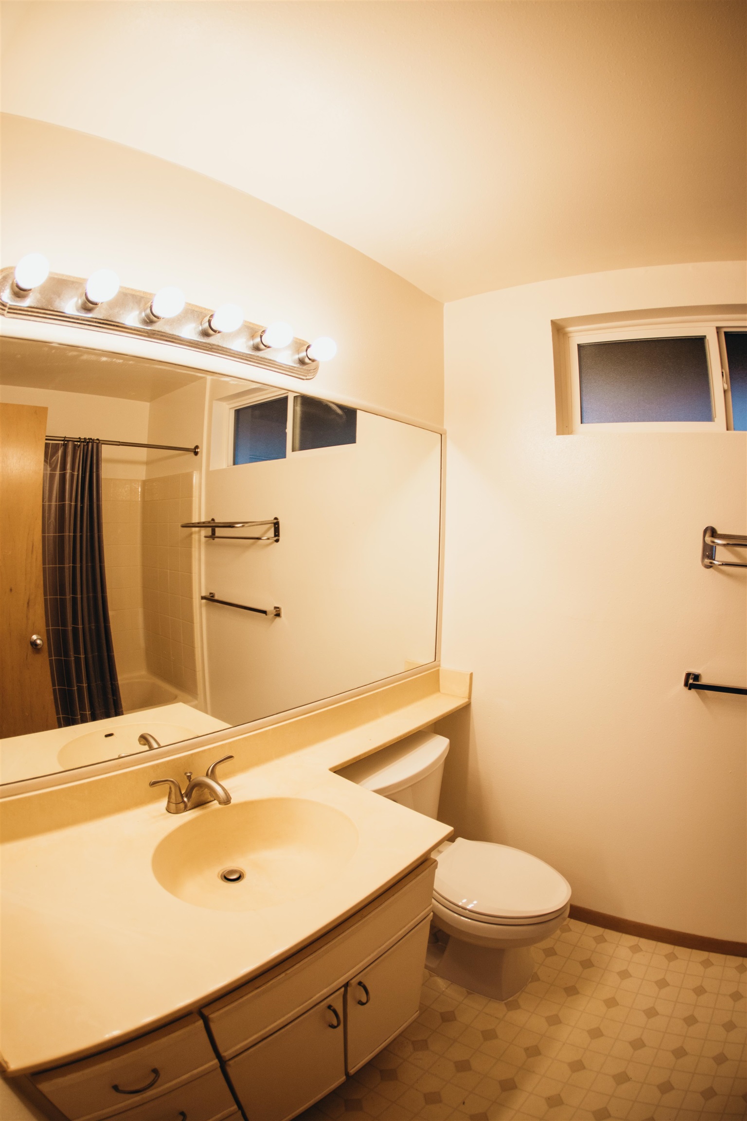 64 Kunihi Lane, Unit 324 Kahului, HI 96732 - Photo 28 of 31 a bathroom with a sink a toilet and shower