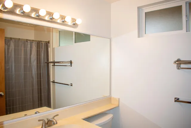 a bathroom with a shower and a bathtub