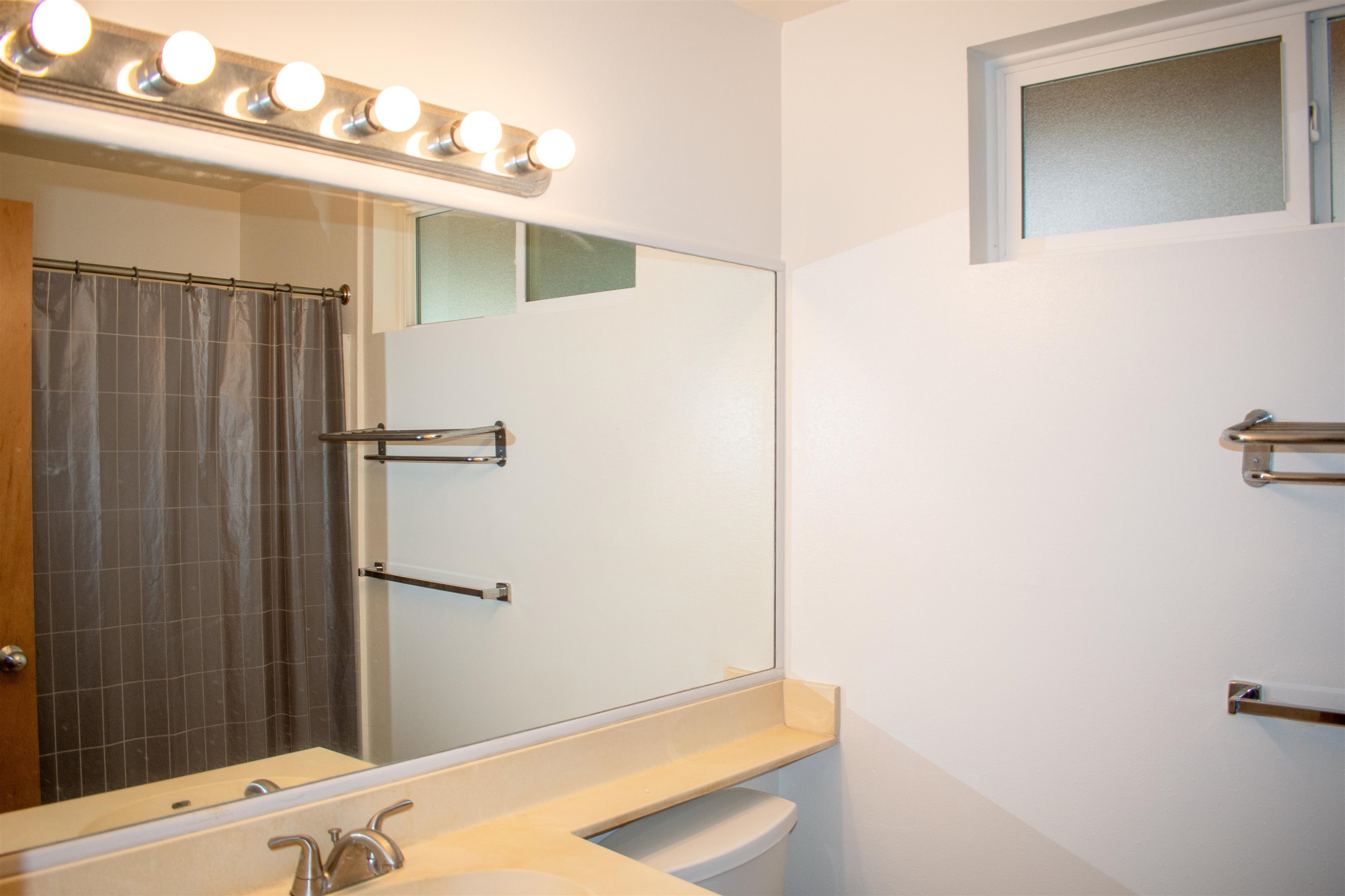 64 Kunihi Lane, Unit 324 Kahului, HI 96732 - Photo 29 of 31 a bathroom with a shower and a sink