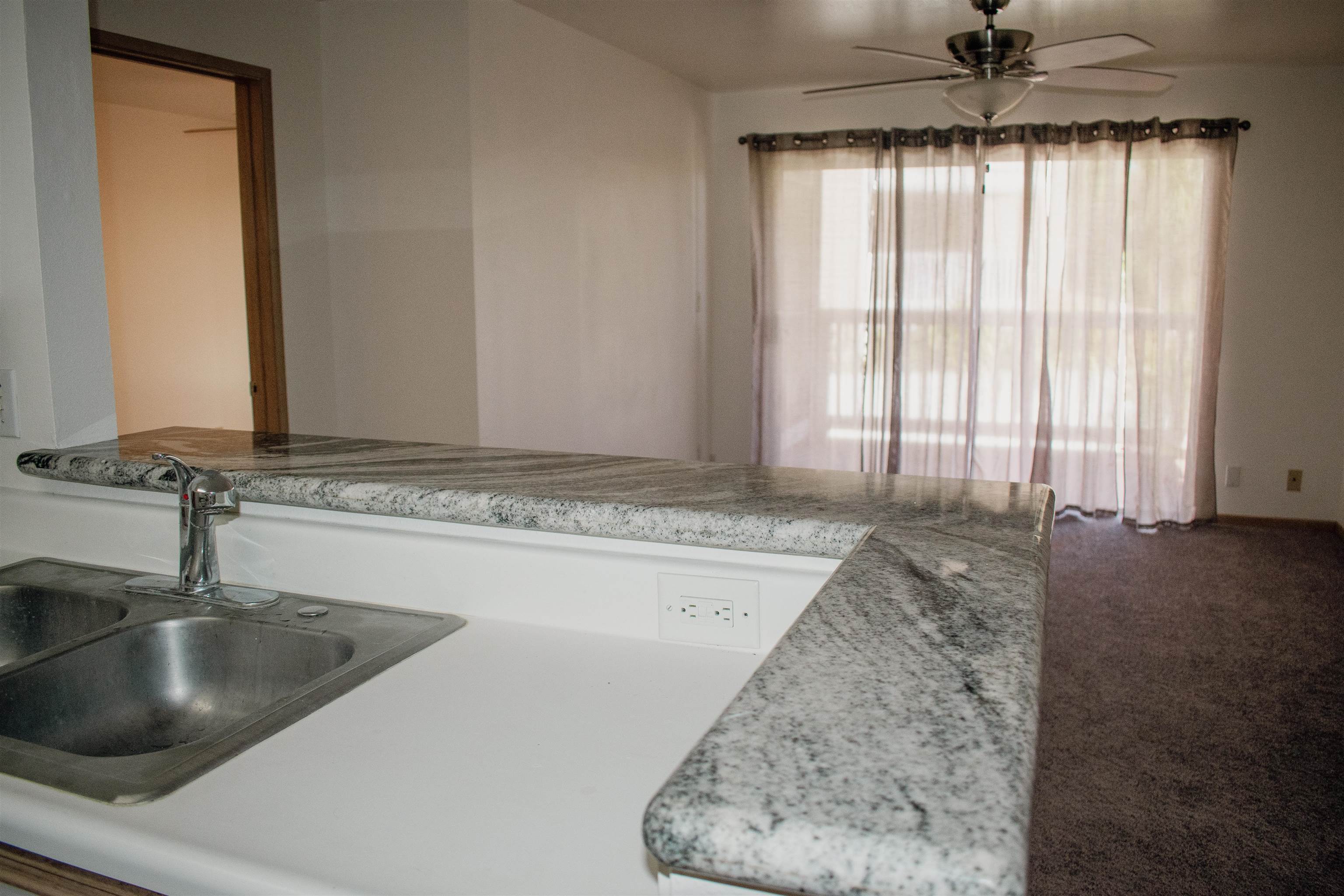 64 Kunihi Lane, Unit 324 Kahului, HI 96732 - Photo 9 of 31 a view of a kitchen counter space a sink and dishwasher