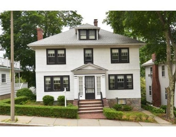 120 Lake Street Boston, MA 02135 - Photo 1 of 28 a front view of a house with a yard