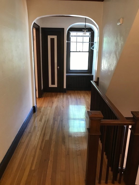 120 Lake Street Boston, MA 02135 - Photo 12 of 28 a view of front door with wooden floor