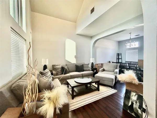 a kitchen with a sink appliances and cabinets