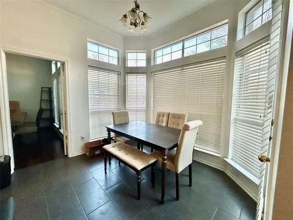 a view of a living room and a window in a room