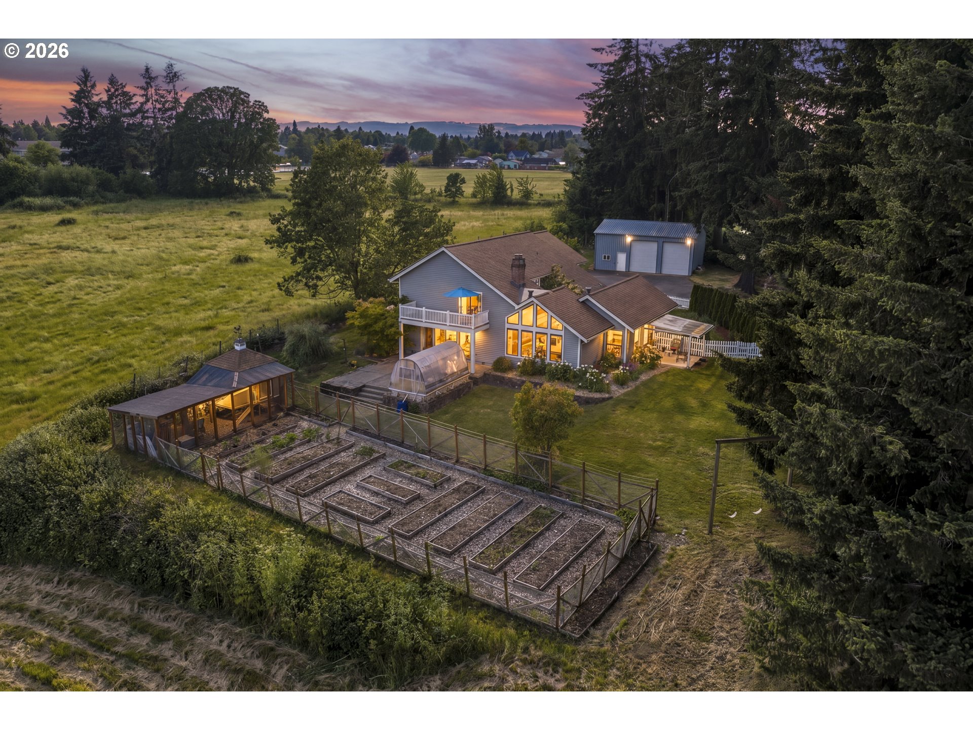 4515 Cordon Road Northeast Salem, OR 97305 - Photo 2 of 48 a aerial view of a house with a garden and lake view