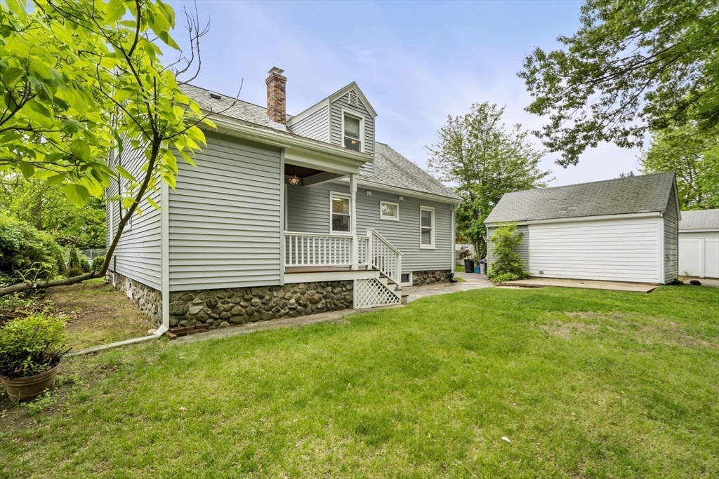 5 Walker Avenue Andover, MA 01810 - Photo 23 of 23 a front view of a house with a garden