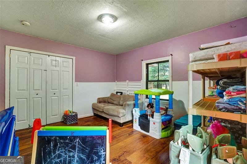 5099 Austell Powder Springs Road Austell, GA 30106 - Photo 13 of 38 a room with musical instruments