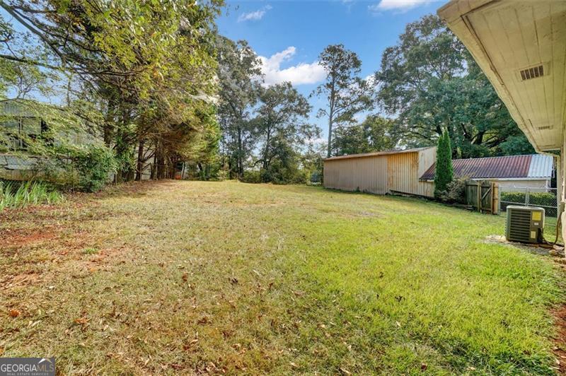 5099 Austell Powder Springs Road Austell, GA 30106 - Photo 31 of 38 a view of an outdoor space and yard