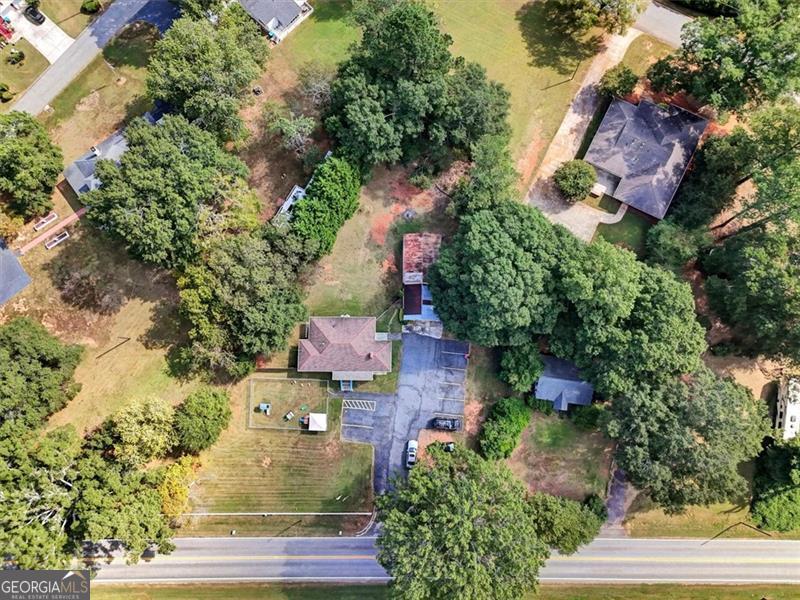 5099 Austell Powder Springs Road Austell, GA 30106 - Photo 38 of 38 an aerial view of a house with a yard