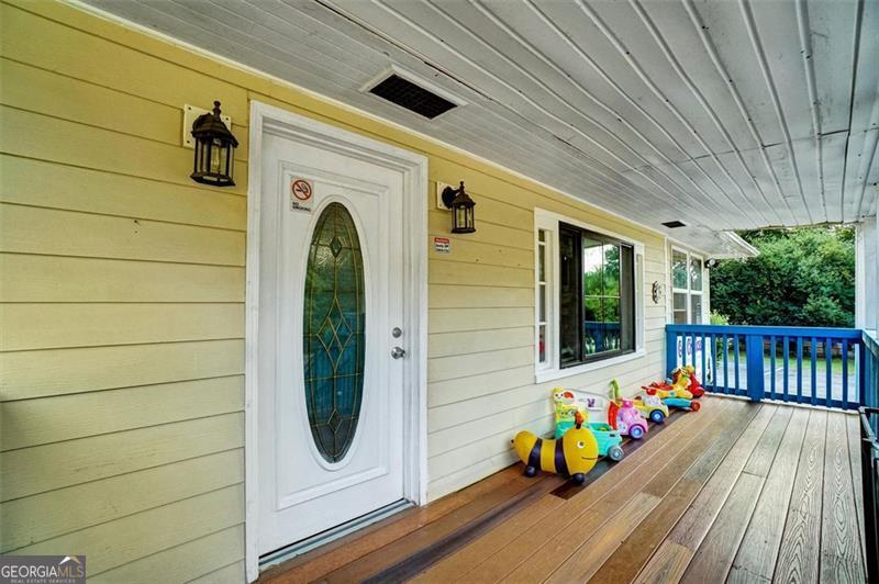 5099 Austell Powder Springs Road Austell, GA 30106 - Photo 4 of 38 a front view of a house with entryway